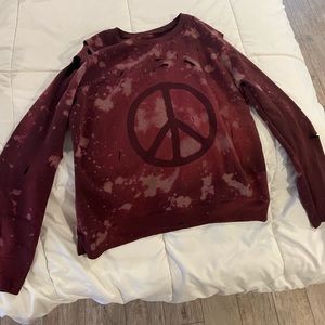 Boutique bleach washed peace sweatshirt. Says size L but fits more like a small